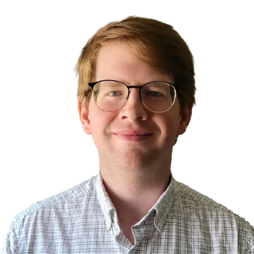 Headshot of a smiling young man wearing glasses and a plaid shirt.